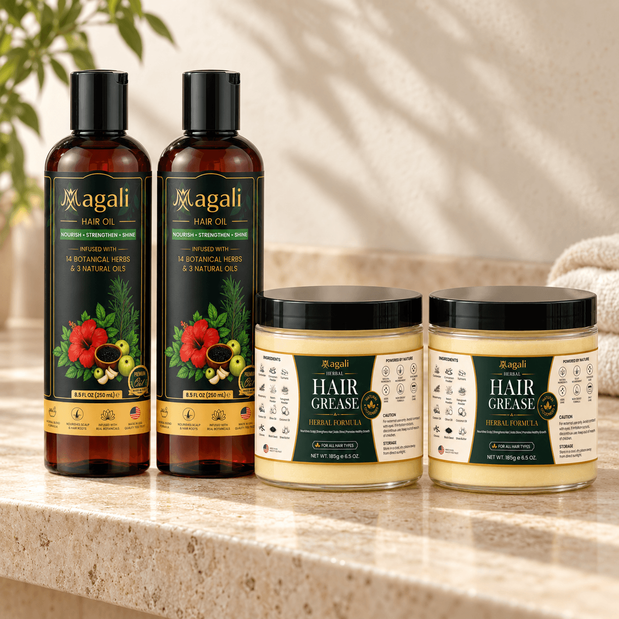 Magali Hair Care Stock-Up Set: 2 hair oil bottles and 2 hair grease jars on a warm stone bathroom counter
