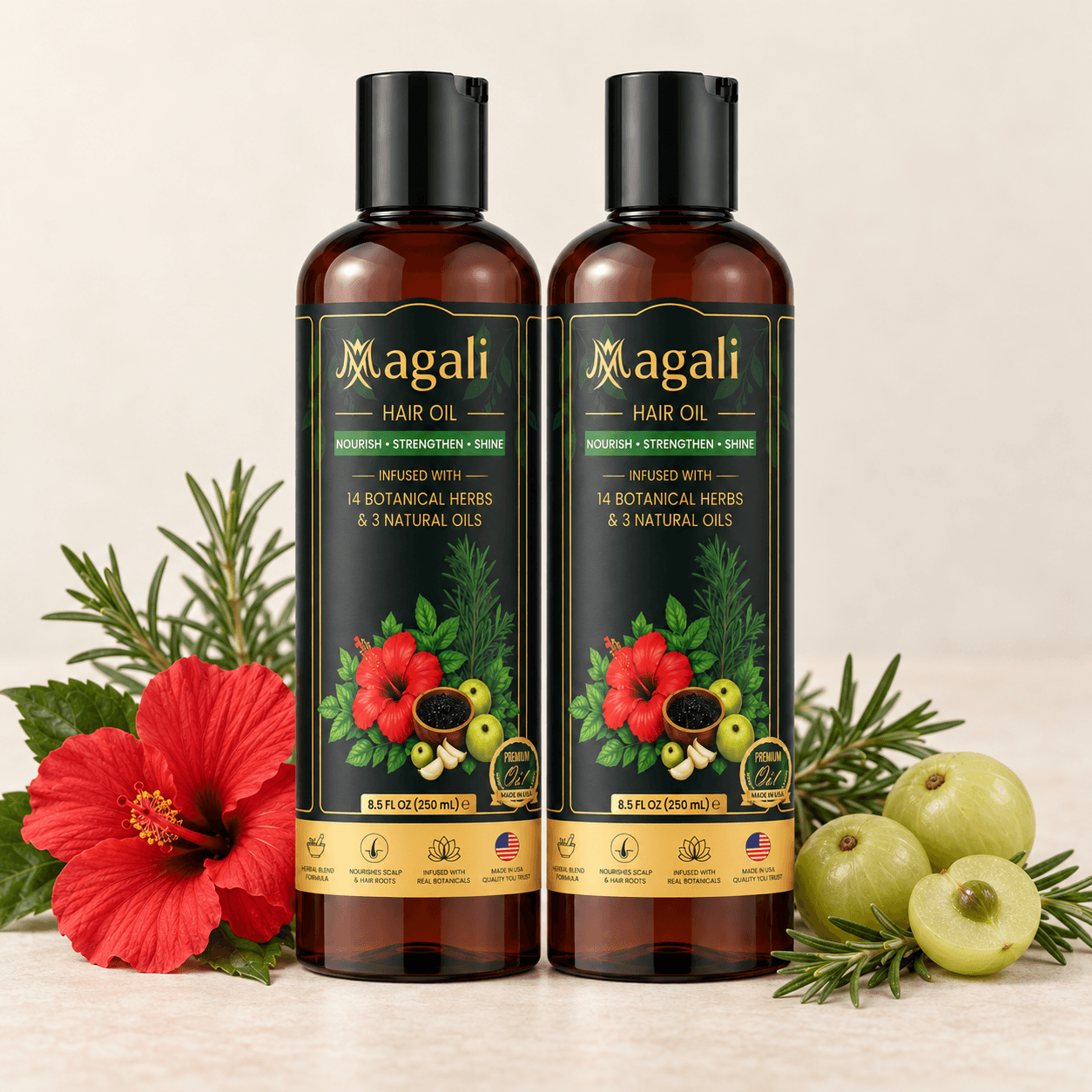 Magali Hair Oil Double Pack: 2 hair oil bottles with a botanical arrangement